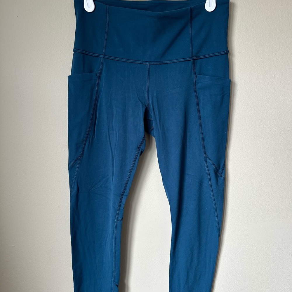 Athleta teal leggings with pockets